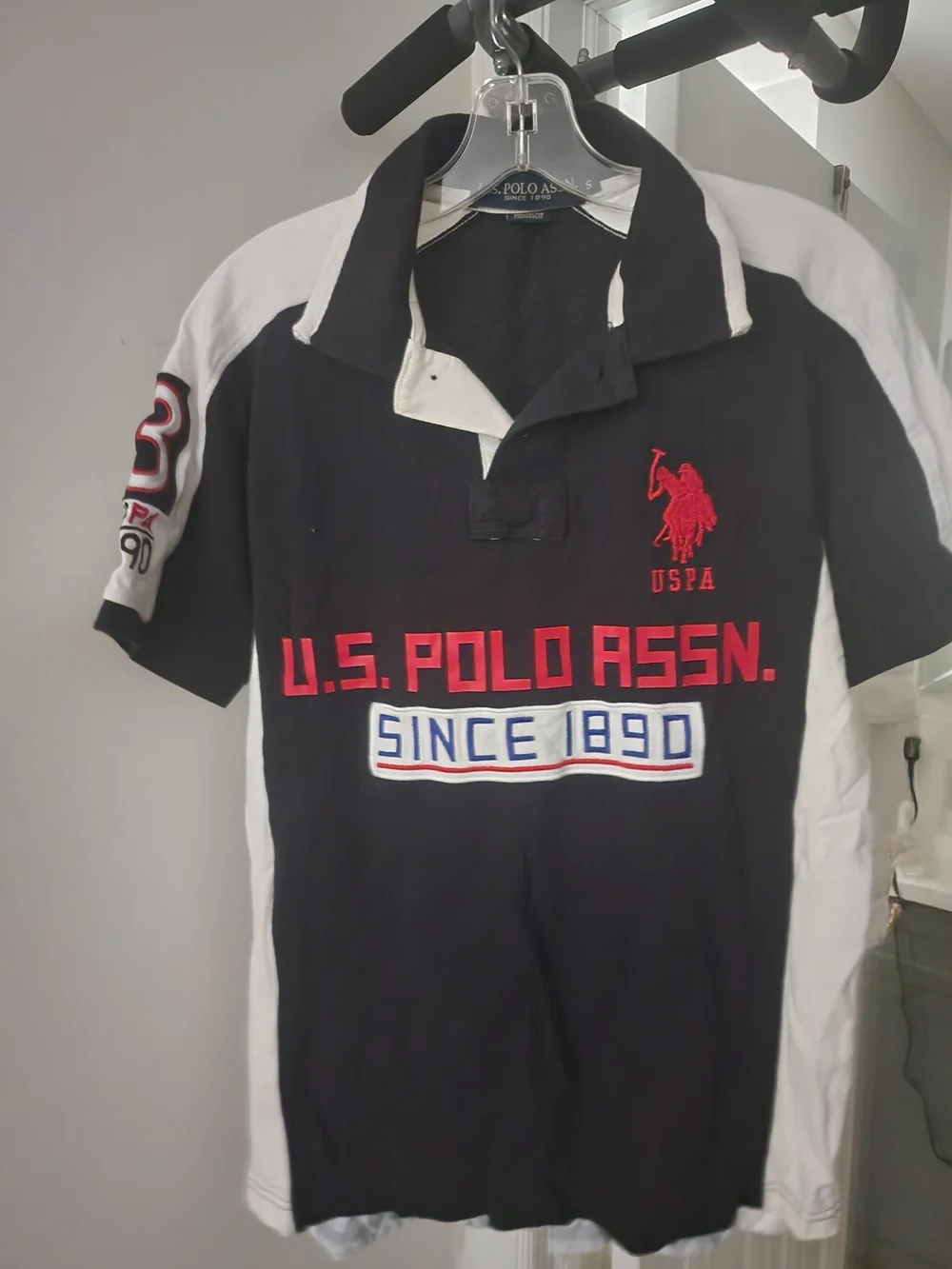 U.S. Polo Assn. Black & White Rugby Polo with Red Logo and Red Chest Text